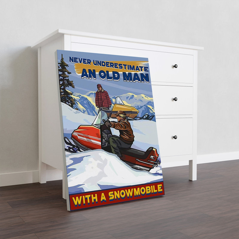 Jamais sous-estimé «Old Man With Snowmobile», toile tendue avec châssis - Hobby Illustration Decor, bleu et rouge Home Decor