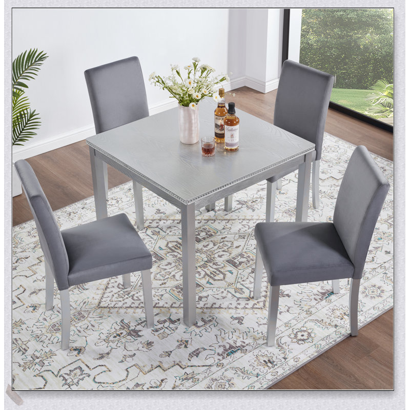 Ensemble de table de salle à manger en bois Elegant avec table carrée et 4 chaises rembourrées