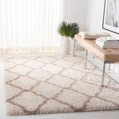 Tapis à motif géométrique ivoire / beige Darrold