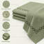 Nappe en lin vert sauge avec bordure découpée décorative