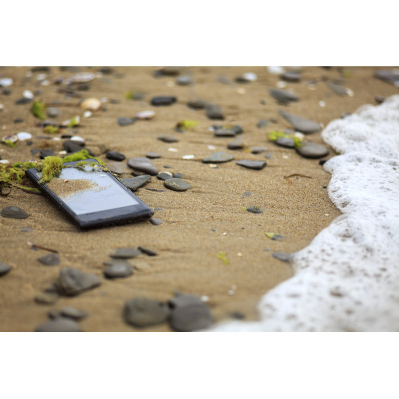Lost Phone In The Sand by MartenBG - Wrapped Canvas Print, 30 cm H x 46 cm W