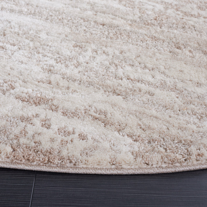 Ivory and Beige Abstract Rectangular Synthetic Area Rug