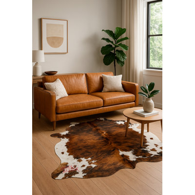Tapis brun / blanc en cuir de vache Rivington