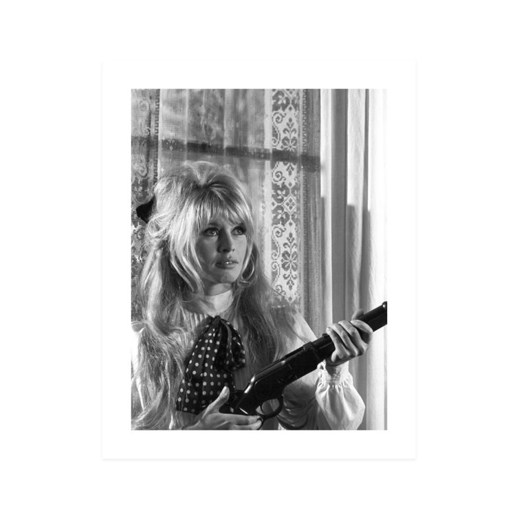 Globe Photos Entertainment Brigitte Bardot Standing With Gun In Hand On ...
