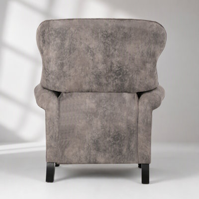 Fauteuil inclinable manuel moderne avec revêtement en microfibre, inclinaison à 3 positions, accoudoirs arrondis, garniture cloutée et pieds en bois d'hévéa pour une détente confortable.