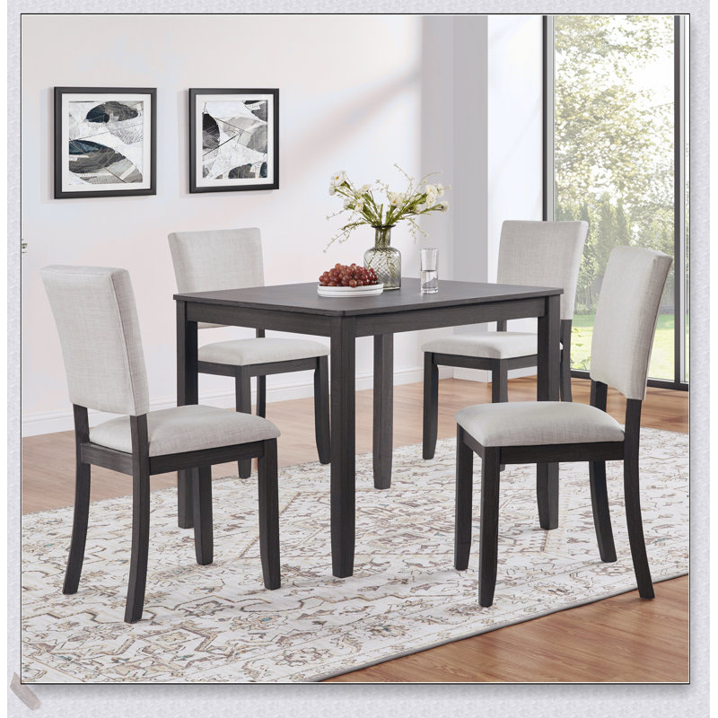 Ensemble de table de salle à manger moderne en bois pour 4 personnes avec chaises rembourrées, parfait pour les repas de famille et les rassemblements