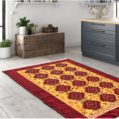 Tapis jaune / rouge / noir en laine noué à la main