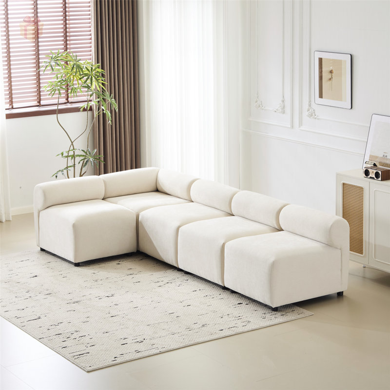 Canapé modulaire à dossier rond avec structure robuste, mousse haute densité confortable et sièges flexibles pour une vie moderne