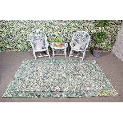 Tapis turc vert authentique en laine avec un design nomade pour une décoration de chambre bohémienne