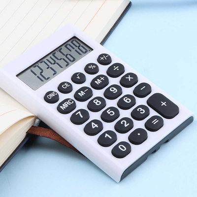 A  calculator Basic Standard Calculators Mini Digital Desktop Calculator With 8-Digit LCD Display. Calculator Pocket Size For Home School For Kids