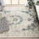 Annette Oriental Ivory/Blue Area Rug
