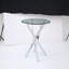 Le plateau de table circulaire en verre trempé moderne est jumelé à un cadre en fer mesurant 35,43 pouces de longueur.-1016739995