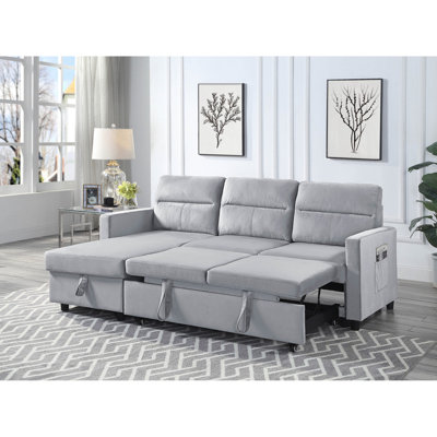 Canapé-lit modulaire réversible en velours gris avec poche latérale et rangement. Sièges rembourrés de mousse, ressorts. 81,5 po x 60 po x 33,5 po, support à ressorts de 179 lb. 81,5 po x 60 po, 33,5 po