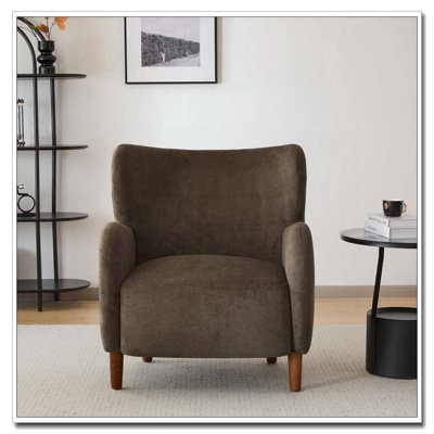 Fauteuil club à oreilles en velours