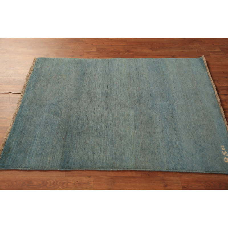 Tapis bleu et vert en laine Gabbeh
