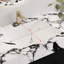 Meuble-lavabo mural simple noir de 91 cm (36 po) avec lavabo en céramique et comptoir en pierre frittée veinée.