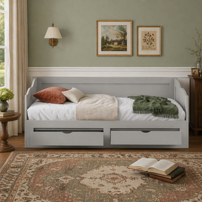 Lit de jour extensible en bois avec lit gigogne et rangement, idéal pour les chambres d'amis multifonctionnelles et peu encombrantes