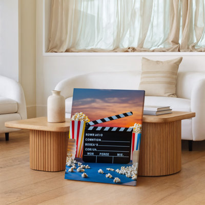 Canvas A Vibrant Cinematic Still Life Composition Featuring A Classic Black Wall Art Film Clapperboard Adorned With Colorful Striped Canvas Wall Art