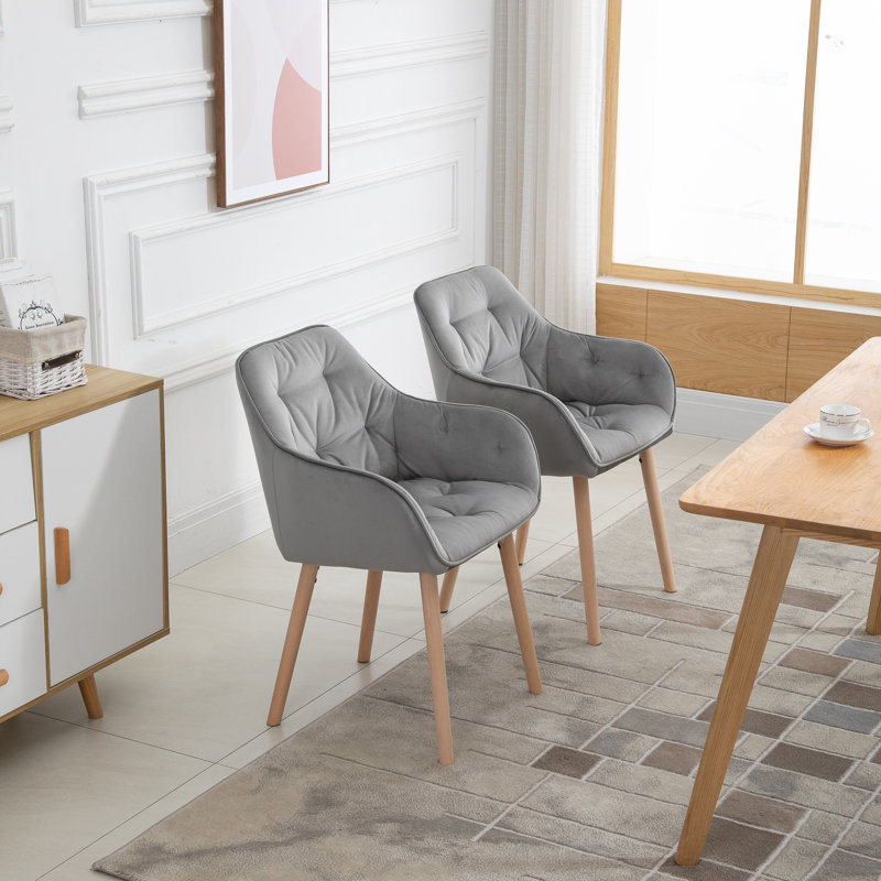 Fauteuil capitonné en velours Pedigree