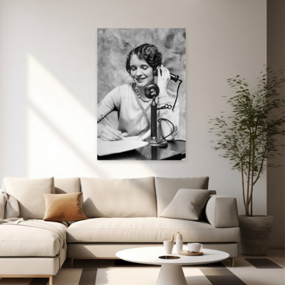1920S Smiling Woman Sitting At Desk Writing And Talking On Candlestick Telephone Classic Retro Vintage Portrait Wall Art