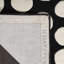 Tapis noir en laine touffeté à la main à motif abstrait Jorie-963039272