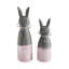 Ensemble de 2 lapins Spring In Bloom en bois avec base rose