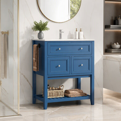 Meuble-lavabo avec lavabo en céramique et rangement astucieux, armoire indépendante avec tiroir basculant, tablette ouverte et porte-serviettes réversible