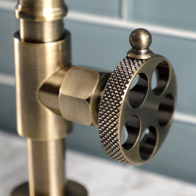 Kingston Brass Webb Two-Handle 2-Hole Deck Mount Bridge Bathroom Faucet with Knurled Handle and Push Pop-Up Drain
