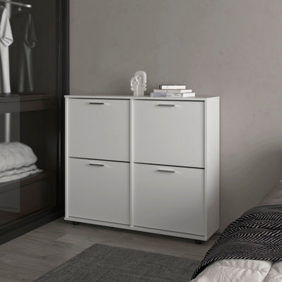Armoire de rangement blanche à chaussures inclinable avec plusieurs compartiments et design moderne