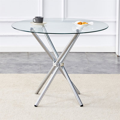 Table de salle à manger ronde en verre transparent avec une forme unique pour 4 à 6 personnes, avec des pieds en métal argenté en forme d'anneau, convenant aux bureaux, aux cuisines, aux terrasses et aux salles à manger.