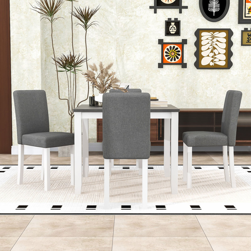 Ensemble repas compact pour 4 personnes avec table carrée et 4 chaises rembourrées