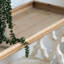 Élégante console inspirée du foyer avec placage en bois naturel, parfaite pour un décor intérieur élégant et fonctionnel.