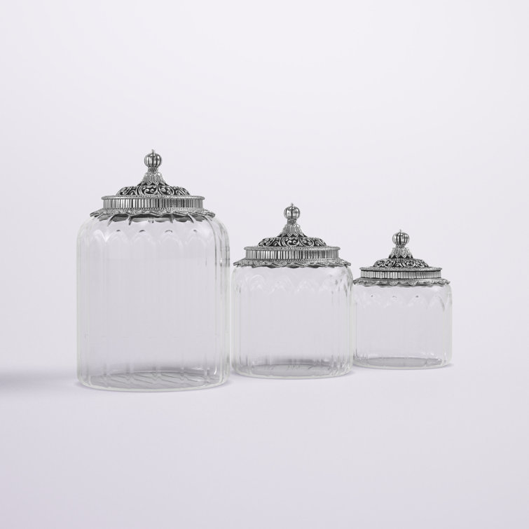 https://assets.wfcdn.com/im/97821779/resize-h755-w755%5Ecompr-r85/2038/203812437/3+Pieces+Clear+Glass+Decorative+Jars+with+Engraved+Silver+Lids+6%22%2C+7%22%2C+9%22+H.jpg