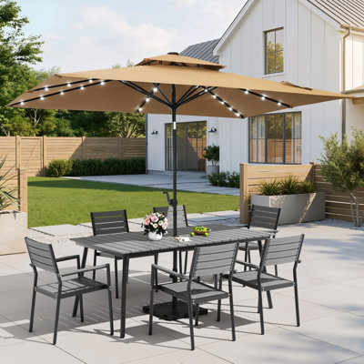 Ensemble de salle à manger en aluminium pour 6 personnes avec chaises empilables, parasol solaire à DEL et base lestée