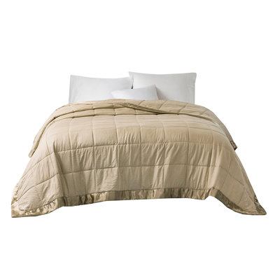 Très grande couverture en duvet synthétique avec bordure en satin