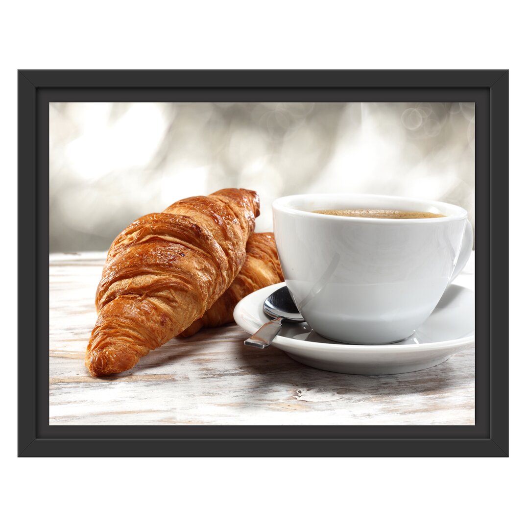 Gerahmtes Wandbild Frisches Croissant und Kaffee