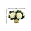 Arrangement d'hortensias et de feuilles de magnolia dans un vase en métal