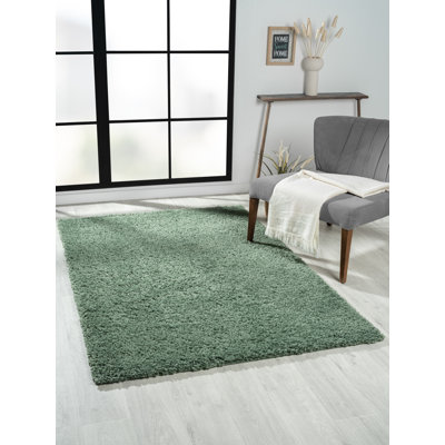 Lush shaggy carpet in  green