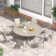 Round Patio Dining Set with 60" Metal Dining Table and 8 Stackable Armrest Textilene Chairs
