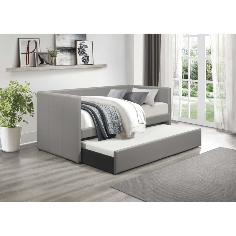 Lit de jour contemporain en similicuir avec couchette coulissante pour un espace de sommeil supplémentaire et un style moderne