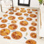 Tapis intérieur / extérieur orange / crème Kaue-674523410