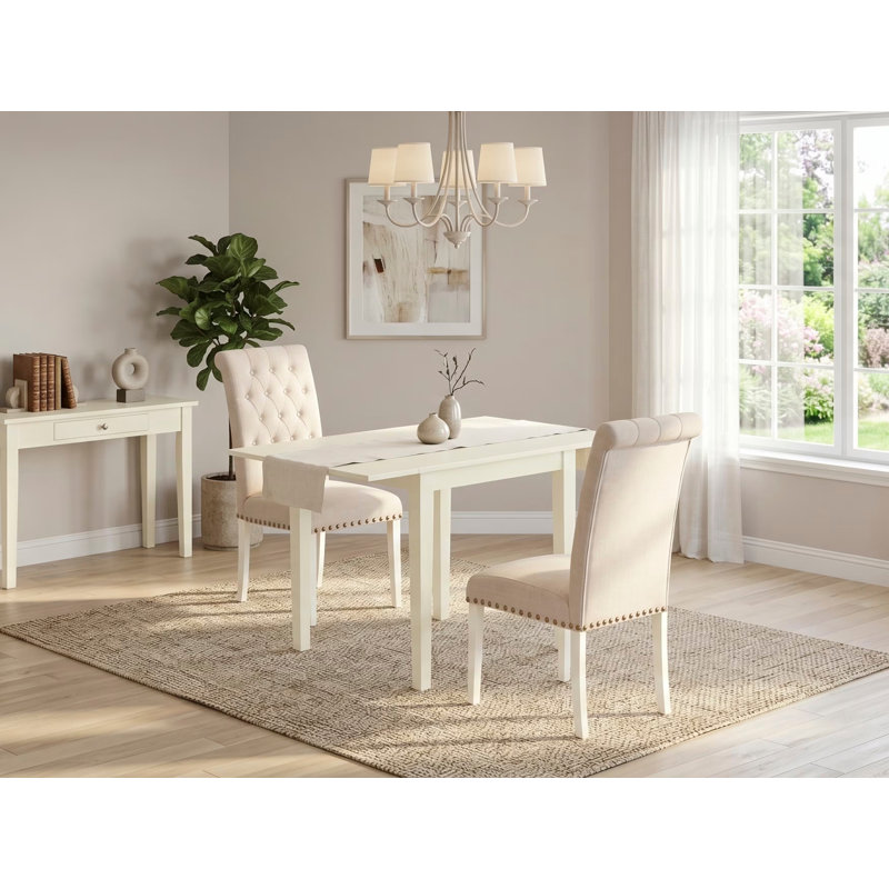 L'ensemble de salle à manger 3 pièces pour petits espaces contient une table de salle à manger rectangulaire avec Dropleaf et 2 chaises Parson en tissu beige clair, lin blanc