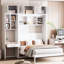 Lit double compact avec trois armoires et un support de matelas flexible