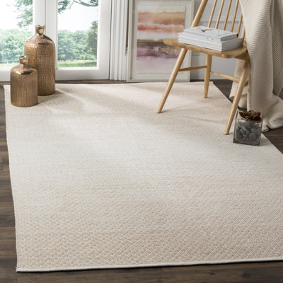 Tapis beige / ivoire en coton tissé à plat à la main à motif géométrique Alannah