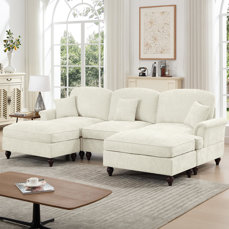 Beige blanc confortable à 3 places en forme de U avec accoudoirs évasés, jupes de plis à volants amovibles et repose-pieds mobiles, segmenté pour un soutien total