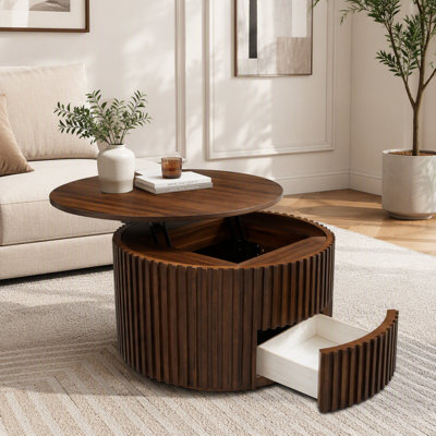 Table basse ronde à plateau relevable au design cannelé