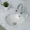 Lavabo de salle de bain circulaire encastré blanc avec trop-plein