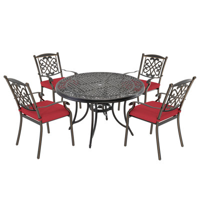 4 - Person Patio Dining Set with Round Table , Cushions Included