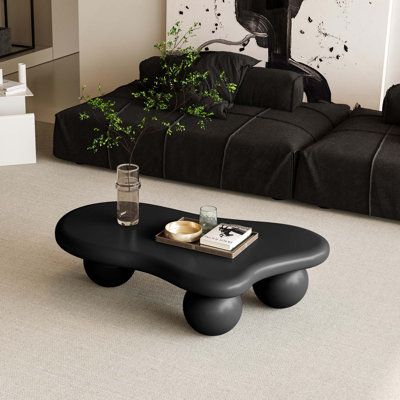 Table basse en forme de nuage avec 3 pieds sphériques pour la décoration du salon et une utilisation pratique