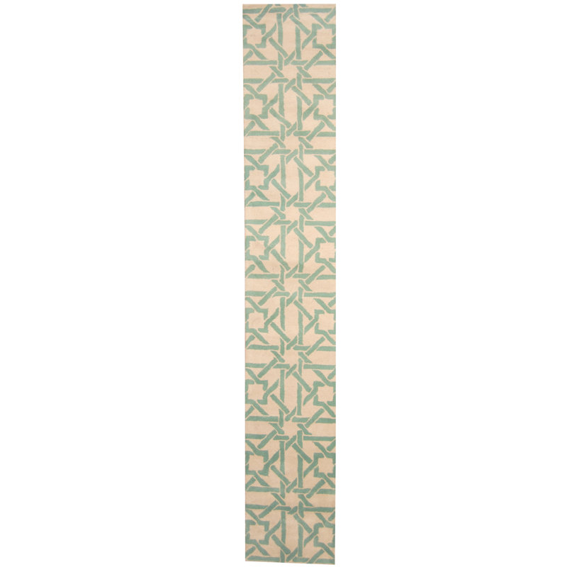 Tapis ivoire / bleu sarcelle touffeté à la main